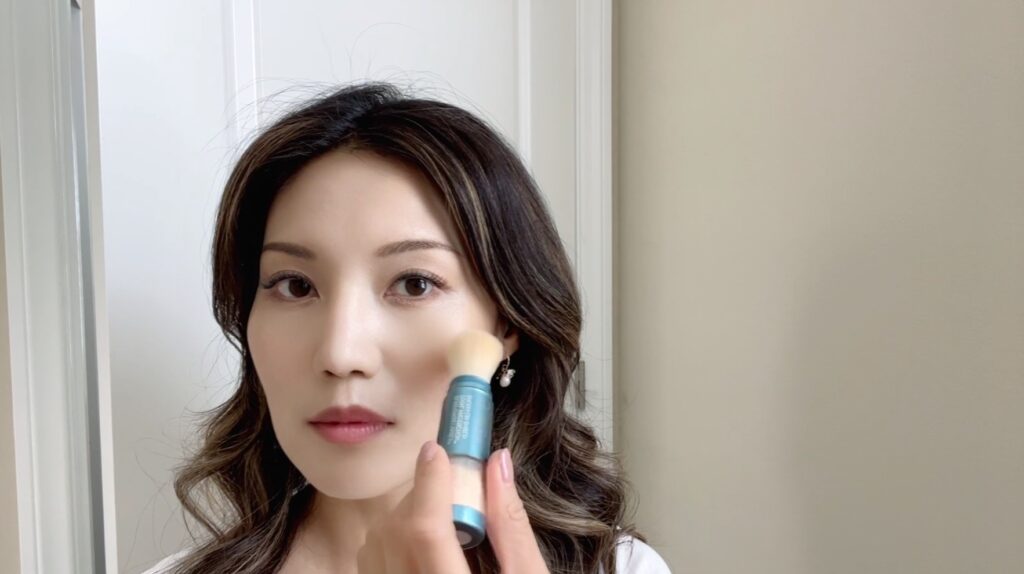 Sunscreen reapplication using brush-on powder sunscreen